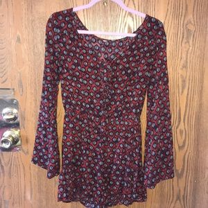 long sleeved patterned romper